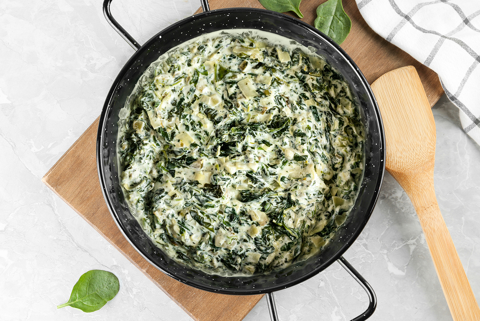 pan of homemade spinach and artichoke dip