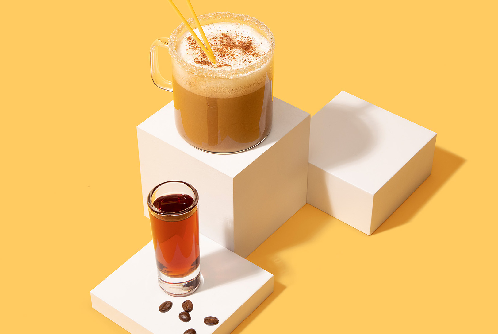 cup of coffee with liqueur and coffee beans