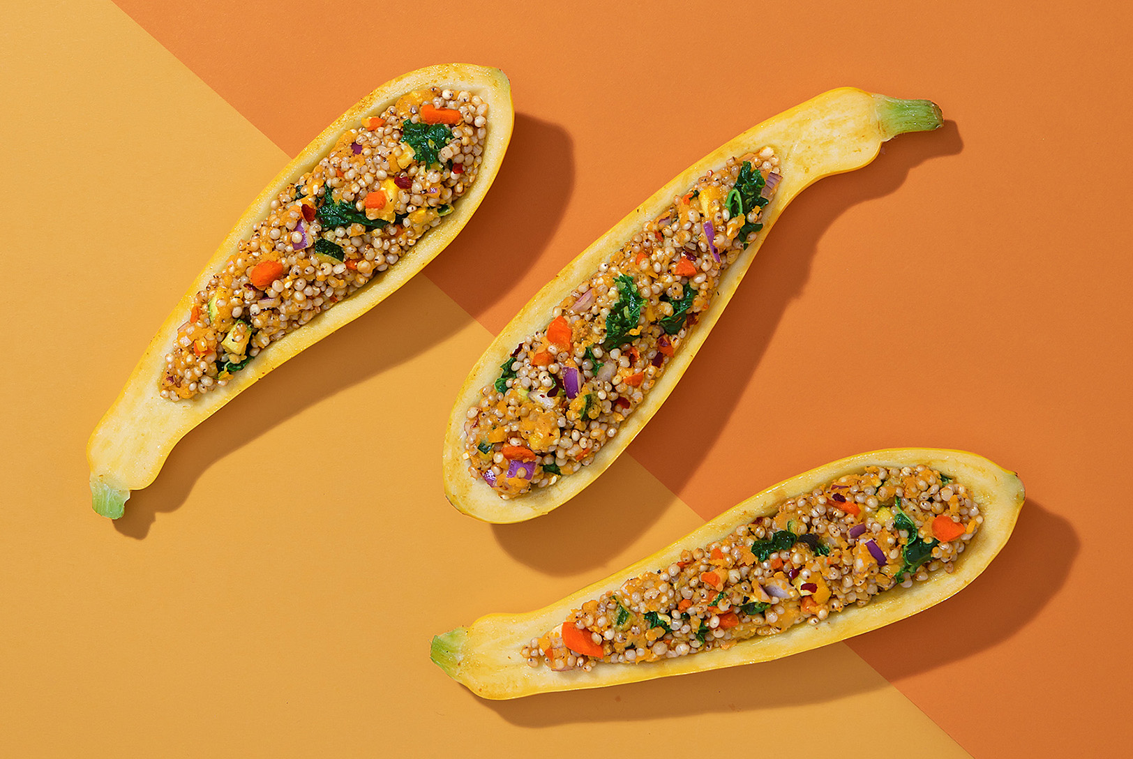 roasted squash stuffed with spiced sorghum, kale, and lentils