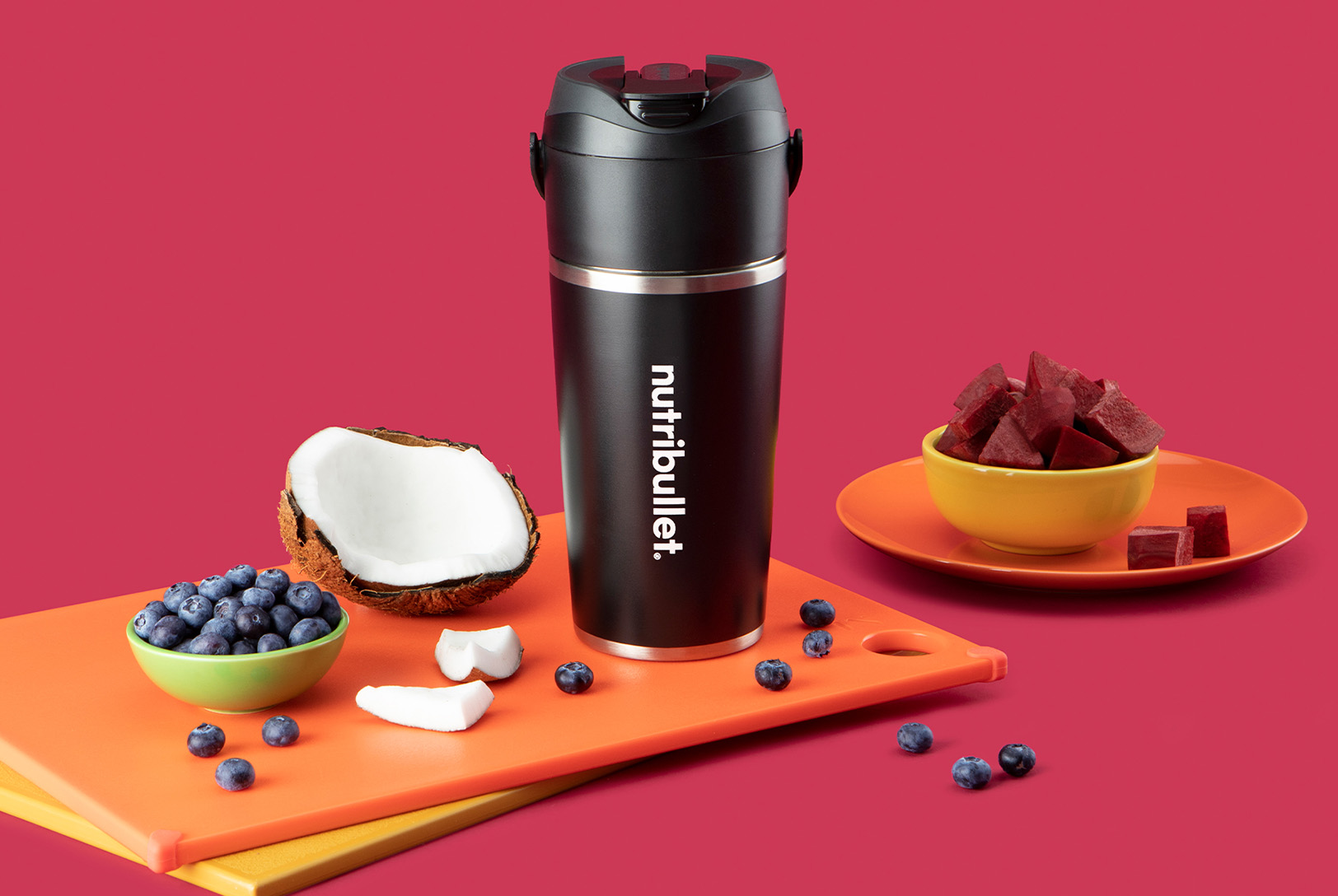 Black nutribullet Flip with beets, coconut, and blueberries